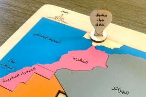 Map of North Africa with labeled regions on a wooden board